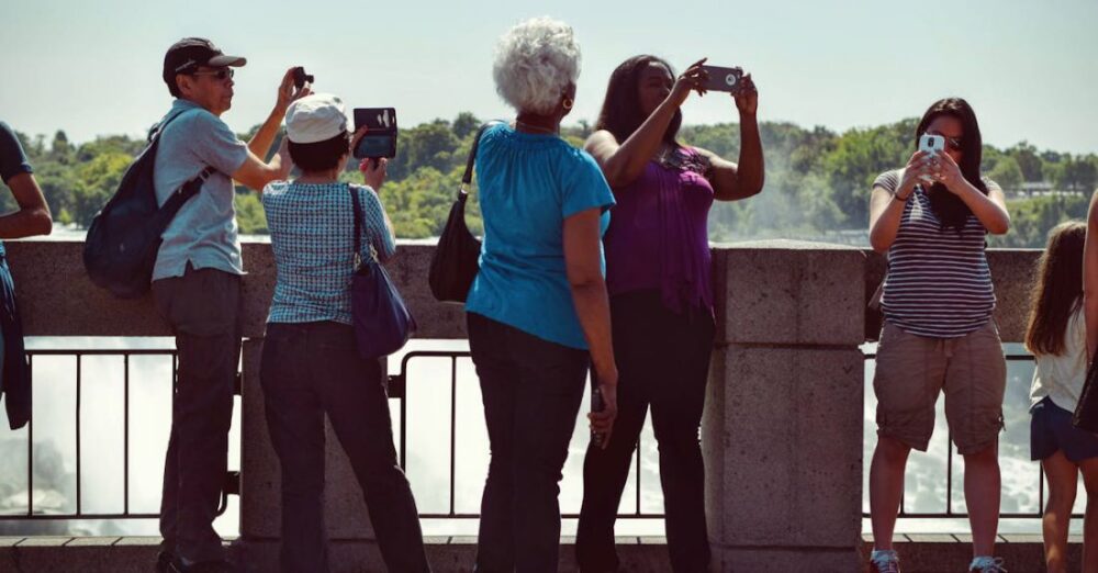 Tourists - People Taking Pictures during Daytime